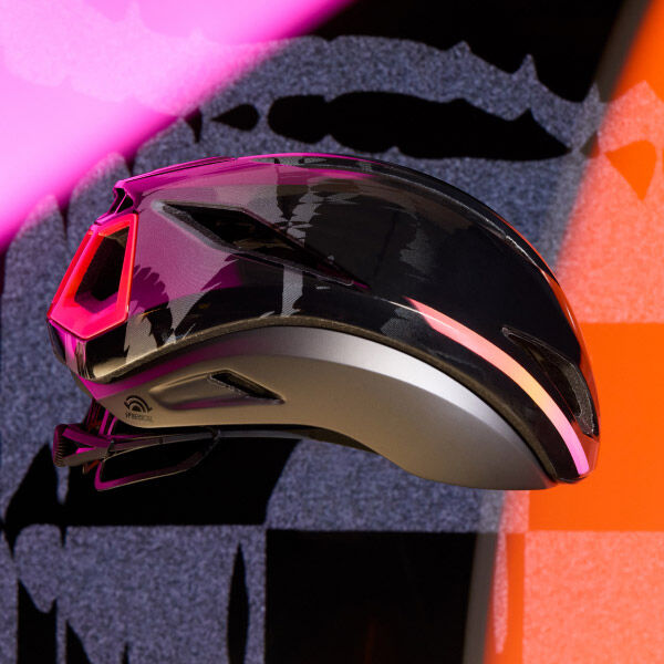 Giro Shadow Collection helmet with pink and orange background
