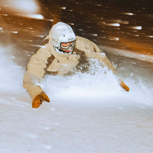 Snowboarder in powder