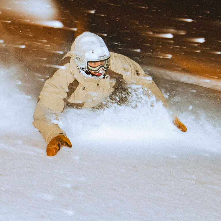 Snowboarder in powder