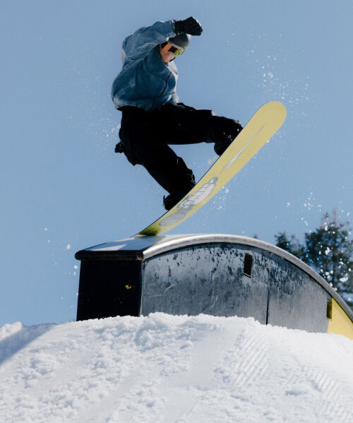 snowboarder going on a ramp