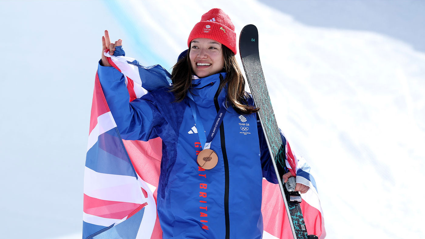 Zoe Atkin holding Ski and Bronze Olympic Model
