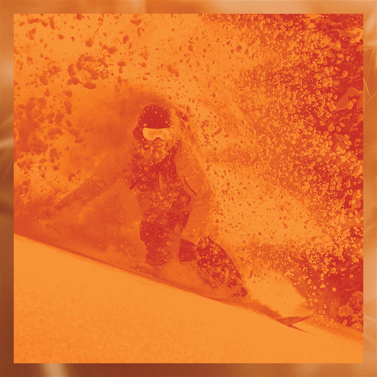 Orange overlay on a image of a skier on a mountain