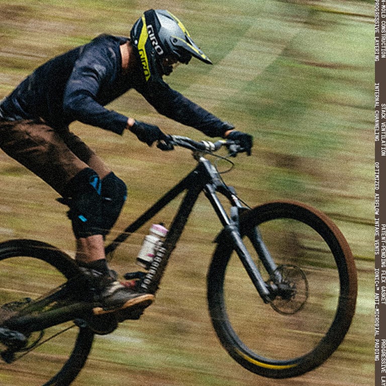 Giro MTB rider going downhill in Giro MTB helmet