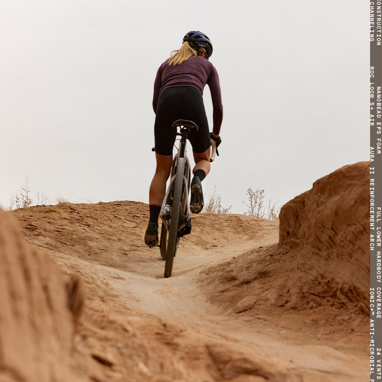 Rider on a gravel road with Giro Eclipse helmet