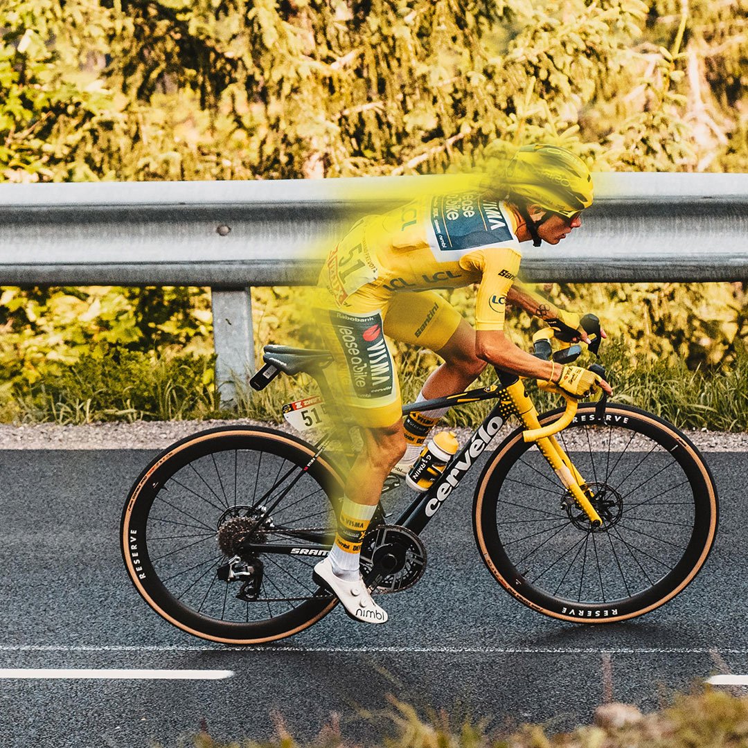 tour de france racers with yellow treatment